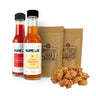 Crispy fried chicken served with Taste Lab Jalapeño Kiwifruit and Hot Pepper Original sauces on a white background.