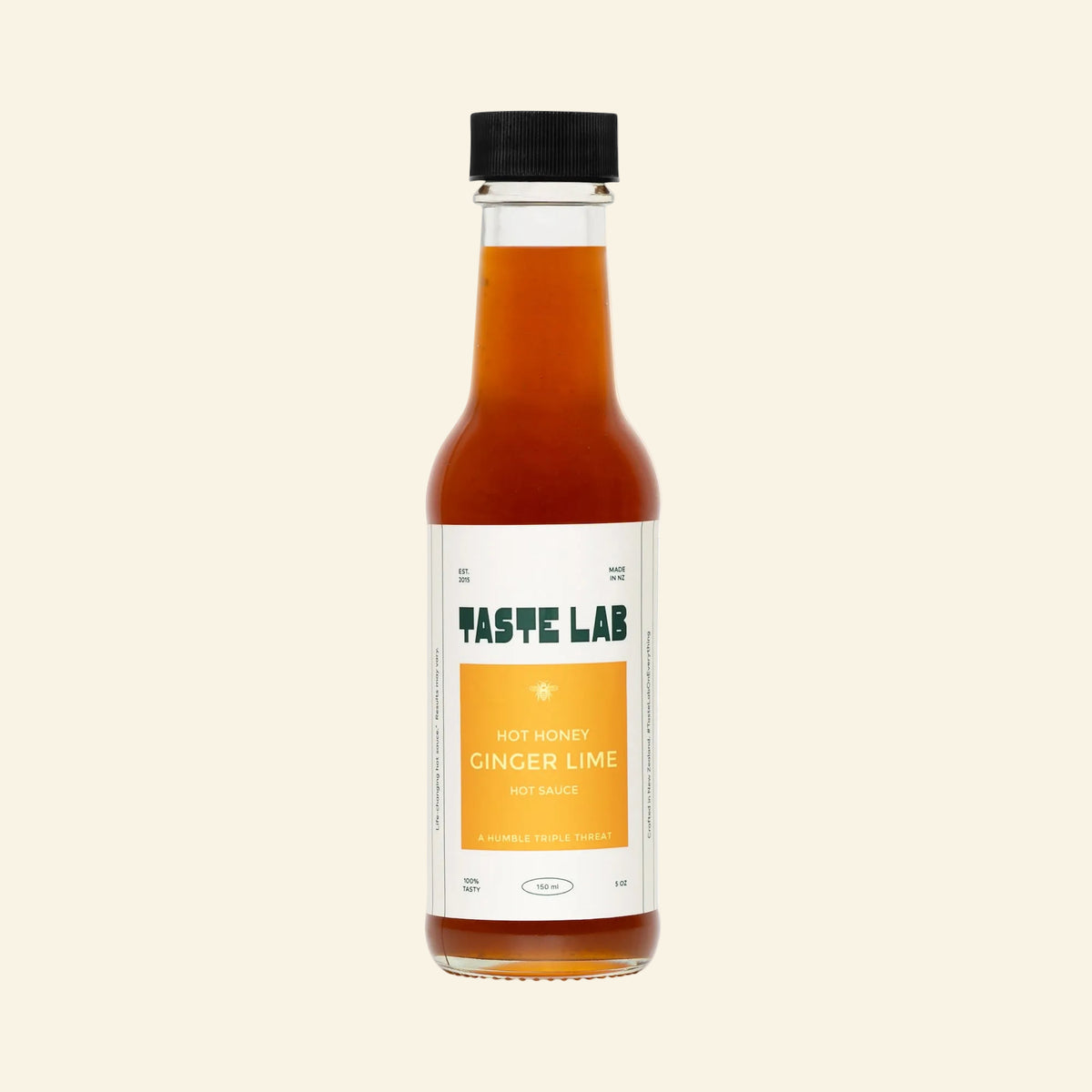 Bottle of Taste Lab Hot Honey Ginger and Lime Hot Sauce