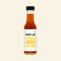Bottle of Taste Lab Hot Honey Original hot sauce