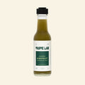 Bottle of Taste Lab Jalapeño Kiwifruit Hot Sauce
